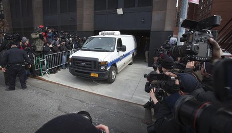 A New York City Medical Examiner van leaves the apartment building of designer L'Wren Scott in the Manhattan borough of New York March 17, 2 A New York City Medical Examiner van leaves the apartment building of designer L'Wren Scott in the Manhattan borough of New York March 17, 2