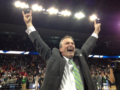 NDSU Head Coach Saul Phillips celebrates his team's 80-75 OT upset victory over the University of Oklahoma. NDSU Head Coach Saul Phillips celebrates his team's 80-75 OT upset victory over the University of Oklahoma.