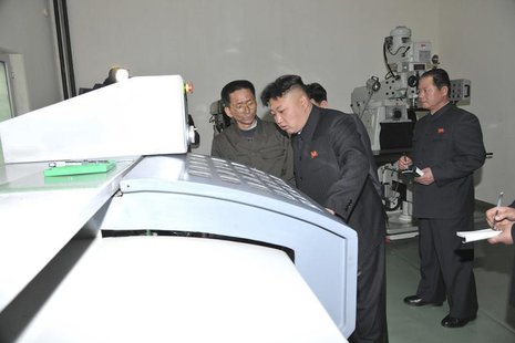 North Korean leader Kim Jong Un (C) provides field guidance during a visit to a machine plant managed by Kang Thae Ho in this undated photo North Korean leader Kim Jong Un (C) provides field guidance during a visit to a machine plant managed by Kang Thae Ho in this undated photo