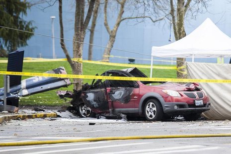 Wreckage is pictured where a television news helicopter crashed near the Space Needle in Seattle, Washington March 18, 2014. REUTERS/David R Wreckage is pictured where a television news helicopter crashed near the Space Needle in Seattle, Washington March 18, 2014. REUTERS/David R