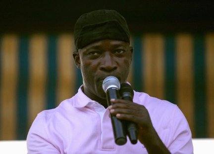 Charles Ble Goude, minister of youth and employment in Ivory Coast's incumbent leader Laurent Gbagbo's government, speaks during a rally wit Charles Ble Goude, minister of youth and employment in Ivory Coast's incumbent leader Laurent Gbagbo's government, speaks during a rally wit