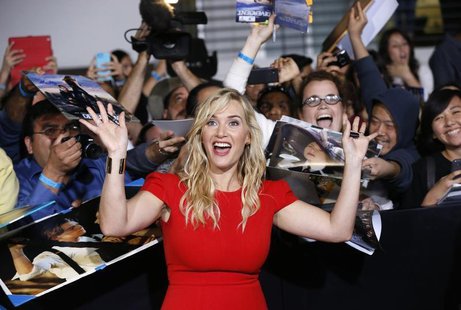 Cast member Kate Winslet poses with fans at the premiere of "Divergent" in Los Angeles, California, March 18, 2014. The movie opens in the U Cast member Kate Winslet poses with fans at the premiere of "Divergent" in Los Angeles, California, March 18, 2014. The movie opens in the U