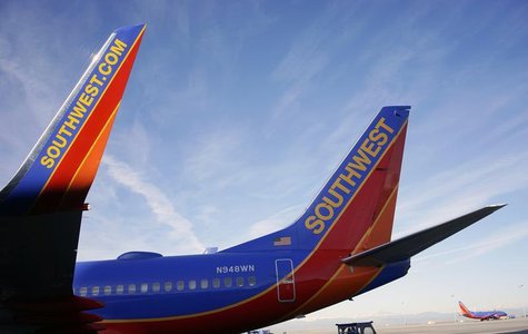 A Southwest Airlines jet waits on the tarmac at Denver International Airport in Denver January 22, 2014. REUTERS/Rick Wilking A Southwest Airlines jet waits on the tarmac at Denver International Airport in Denver January 22, 2014. REUTERS/Rick Wilking