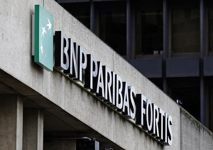 The logo of BNP Paribas Fortis is seen on the entrance of the bank headquarters in Brussels September 18, 2013. REUTERS/Yves Herman The logo of BNP Paribas Fortis is seen on the entrance of the bank headquarters in Brussels September 18, 2013. REUTERS/Yves Herman