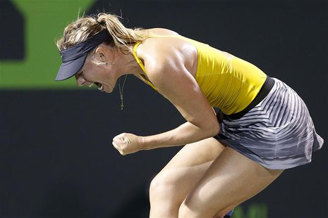 Maria Sharapova reacts during her match against Lucie Safarova (not pictured) on day six of the Sony Open at Crandon Tennis Center. Mandator Maria Sharapova reacts during her match against Lucie Safarova (not pictured) on day six of the Sony Open at Crandon Tennis Center. Mandator
