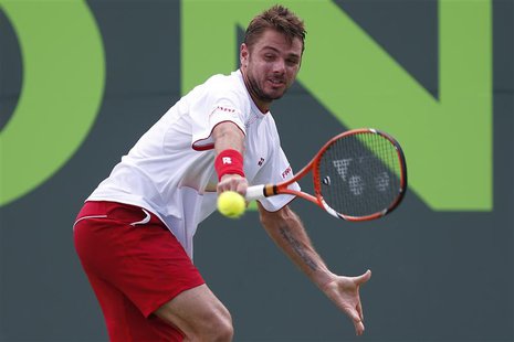 Stanislas Wawrinka hits a backhand against Daniel Gimeno-Traver (not pictured) on day six of the Sony Open at Crandon Tennis Center. Mandato Stanislas Wawrinka hits a backhand against Daniel Gimeno-Traver (not pictured) on day six of the Sony Open at Crandon Tennis Center. Mandato