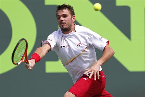 Stanislas Wawrinka hits a forehand against Daniel Gimeno-Traver (not pictured) on day six of the Sony Open at Crandon Tennis Center. Mandato Stanislas Wawrinka hits a forehand against Daniel Gimeno-Traver (not pictured) on day six of the Sony Open at Crandon Tennis Center. Mandato