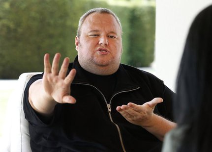Kim Dotcom gestures as he speaks during an interview with Reuters in Auckland January 19, 2013. REUTERS/Nigel Marple Kim Dotcom gestures as he speaks during an interview with Reuters in Auckland January 19, 2013. REUTERS/Nigel Marple