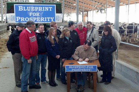 Gov. Scott Walker signs a half-billion dollar property and income tax bill at Horsens Homestead Farms near Cecil, March 24, 2014. (Photo from: FOX 11). Gov. Scott Walker signs a half-billion dollar property and income tax bill at Horsens Homestead Farms near Cecil, March 24, 2014. (Photo from: FOX 11).
