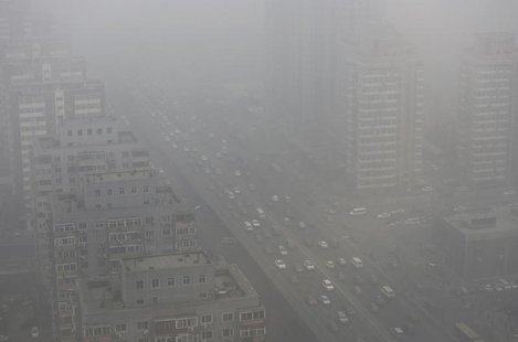 Cars drive on the Three Ring Road amid the heavy haze in Beijing February 26, 2014. REUTERS/Jason Lee Cars drive on the Three Ring Road amid the heavy haze in Beijing February 26, 2014. REUTERS/Jason Lee