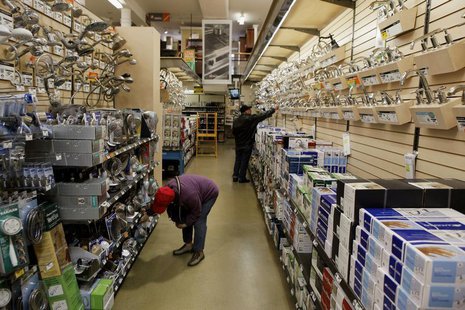 Shoppers look for items in the home improvement department of a Home Depot store in New York April 13, 2011. REUTERS/Lucas Jackson Shoppers look for items in the home improvement department of a Home Depot store in New York April 13, 2011. REUTERS/Lucas Jackson