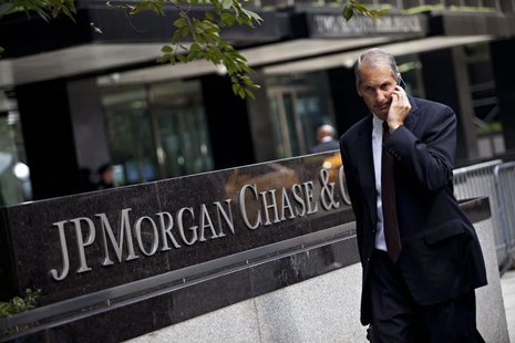 A man walks past JP Morgan Chase's international headquarters on Park Avenue in New York July 13, 2012. REUTERS/Andrew Burton A man walks past JP Morgan Chase's international headquarters on Park Avenue in New York July 13, 2012. REUTERS/Andrew Burton