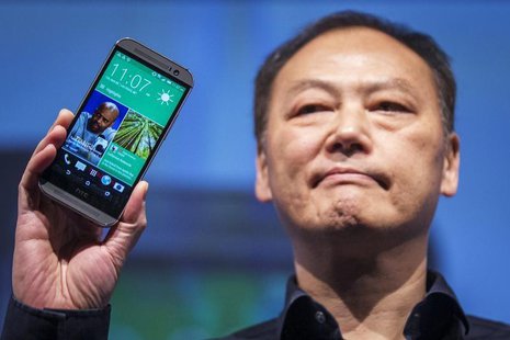 HTC CEO Peter Chou shows the new HTC one (M8) phone during a launch event in New York, March 25, 2014. REUTERS/Brendan McDermid HTC CEO Peter Chou shows the new HTC one (M8) phone during a launch event in New York, March 25, 2014. REUTERS/Brendan McDermid