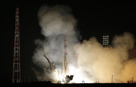 The Soyuz TMA-12M spacecraft carrying the International Space Station (ISS) crew of U.S. astronaut Steven Swanson, Russian cosmonauts Alexan The Soyuz TMA-12M spacecraft carrying the International Space Station (ISS) crew of U.S. astronaut Steven Swanson, Russian cosmonauts Alexan