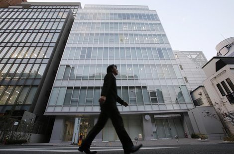 A man walks past a building where Mt. Gox, a digital marketplace operator, is housed in Tokyo February 25, 2014. REUTERS/Toru Hanai A man walks past a building where Mt. Gox, a digital marketplace operator, is housed in Tokyo February 25, 2014. REUTERS/Toru Hanai
