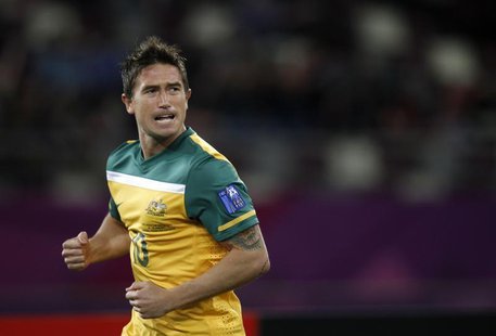 Australia's Harry Kewell celebrates after scoring against Uzbekistan during their 2011 Asian Cup semi-final soccer match at Khalifa stadium Australia's Harry Kewell celebrates after scoring against Uzbekistan during their 2011 Asian Cup semi-final soccer match at Khalifa stadium