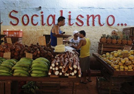 Vendors wait for customers at their stalls, with prices tagged in Cuban pesos, at a market in Havana October 23, 2013. REUTERS/Desmond Boyla Vendors wait for customers at their stalls, with prices tagged in Cuban pesos, at a market in Havana October 23, 2013. REUTERS/Desmond Boyla