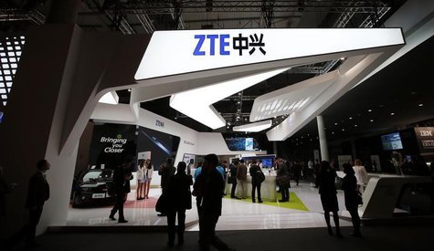 Visitors check out products at the ZTE stand at the Mobile World Congress in Barcelona, February 24, 2014. REUTERS/Albert Gea Visitors check out products at the ZTE stand at the Mobile World Congress in Barcelona, February 24, 2014. REUTERS/Albert Gea