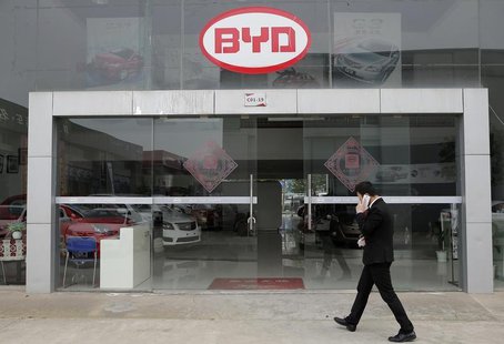 A man walks past a BYD store in Wuhan, Hubei province, March 20, 2014. REUTERS/Stringer A man walks past a BYD store in Wuhan, Hubei province, March 20, 2014. REUTERS/Stringer