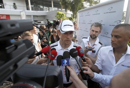 McLaren Formula One driver Jenson Button of Britain speaks to journalists ahead of the Malaysian F1 Grand Prix at Sepang International Circu McLaren Formula One driver Jenson Button of Britain speaks to journalists ahead of the Malaysian F1 Grand Prix at Sepang International Circu