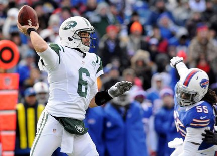 New York Jets quarterback Mark Sanchez (6) is back to pass against Buffalo Bills linebacker Kelvin Sheppard (55) in the first quarter of the New York Jets quarterback Mark Sanchez (6) is back to pass against Buffalo Bills linebacker Kelvin Sheppard (55) in the first quarter of the