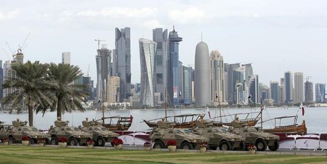 Members of the Qatari Armed Forces travel in armoured personnel carriers (APCs) during National Day celebrations in Doha December 18, 2012. Members of the Qatari Armed Forces travel in armoured personnel carriers (APCs) during National Day celebrations in Doha December 18, 2012.