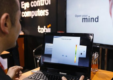 A Tobii Technology representative demonstrates what the Swedish company says is the world's first first eye-controlled laptop at the Consume A Tobii Technology representative demonstrates what the Swedish company says is the world's first first eye-controlled laptop at the Consume