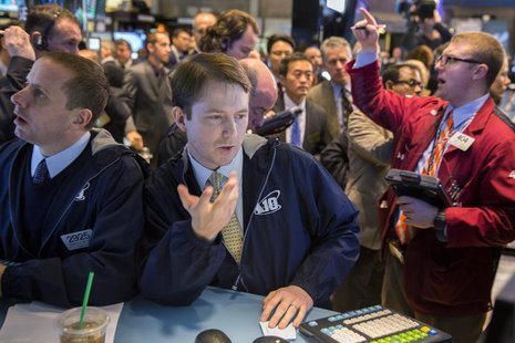 Traders work on the floor of the New York Stock Exchange March 21, 2014. REUTERS/Lucas Jackson Traders work on the floor of the New York Stock Exchange March 21, 2014. REUTERS/Lucas Jackson