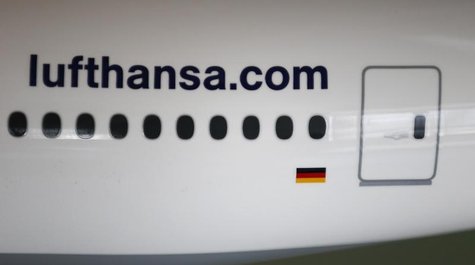 The web address of German air carrier Lufthansa AG is seen on a scale model of a Boing 777 aircraft during the company's annual news confere The web address of German air carrier Lufthansa AG is seen on a scale model of a Boing 777 aircraft during the company's annual news confere