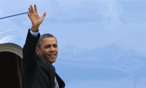 U.S. President Barack Obama waves as he leaves Rome's airport March 28, 2014. REUTERS/Giampiero Sposito U.S. President Barack Obama waves as he leaves Rome's airport March 28, 2014. REUTERS/Giampiero Sposito