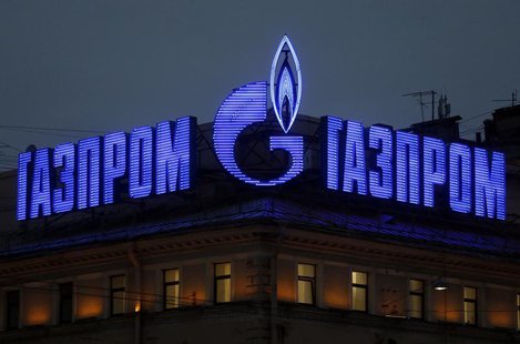 The company logo of Russian natural gas producer Gazprom is seen on an advertisement installed on the roof of a building in St. Petersburg, The company logo of Russian natural gas producer Gazprom is seen on an advertisement installed on the roof of a building in St. Petersburg,