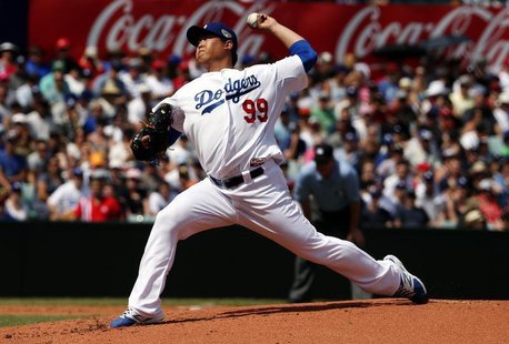 Los Angeles Dodgers pitcher Hyun-Jin Ryu throws a pitch against the Arizona Diamondbacks during the bottom of the second inning in their Maj Los Angeles Dodgers pitcher Hyun-Jin Ryu throws a pitch against the Arizona Diamondbacks during the bottom of the second inning in their Maj