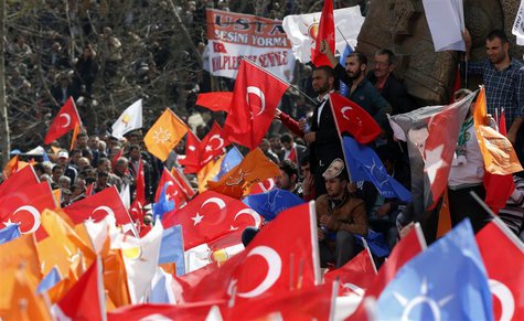 Supporters of the ruling AK Party wave Turkish and party flags during an election rally in Konya, central Turkey, March 28, 2014. REUTERS/Um Supporters of the ruling AK Party wave Turkish and party flags during an election rally in Konya, central Turkey, March 28, 2014. REUTERS/Um