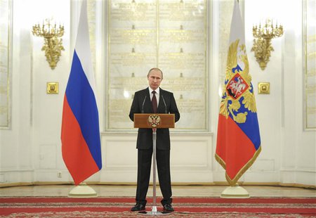 Russian President Vladimir Putin speaks during a ceremony with newly appointed high-ranking military officers in Moscow's Kremlin March 28, Russian President Vladimir Putin speaks during a ceremony with newly appointed high-ranking military officers in Moscow's Kremlin March 28,