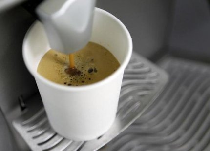 A coffee machine pours coffee into a paper cup in Kiev March 1, 2012.
CREDIT: REUTERS/GLEB GARANICH A coffee machine pours coffee into a paper cup in Kiev March 1, 2012.
CREDIT: REUTERS/GLEB GARANICH