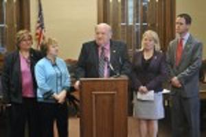 Legislators and supporters announce passage of adoption legislation. Legislators and supporters announce passage of adoption legislation.