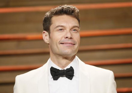 Ryan Seacrest arrives at the 2014 Vanity Fair Oscars Party in West Hollywood, California March 2, 2014. REUTERS/Danny Moloshok Ryan Seacrest arrives at the 2014 Vanity Fair Oscars Party in West Hollywood, California March 2, 2014. REUTERS/Danny Moloshok