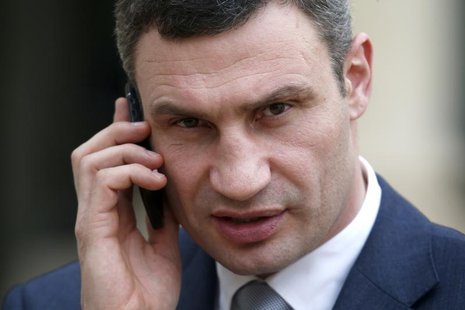 Ukraine opposition leader Vitaly Klitschko, receives a phone call as he leaves the Elysee Palace in Paris, March 7, 2014. REUTERS/Charles Pl Ukraine opposition leader Vitaly Klitschko, receives a phone call as he leaves the Elysee Palace in Paris, March 7, 2014. REUTERS/Charles Pl
