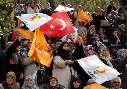 Supporters of the ruling AK Party wave Turkish and party flags during an election rally in Konya, central Turkey, March 28, 2014. REUTERS/Um Supporters of the ruling AK Party wave Turkish and party flags during an election rally in Konya, central Turkey, March 28, 2014. REUTERS/Um