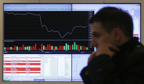 A man walks past an information screen on display inside the office of the Moscow Exchange in the capital Moscow March 14, 2014. REUTERS/Max A man walks past an information screen on display inside the office of the Moscow Exchange in the capital Moscow March 14, 2014. REUTERS/Max