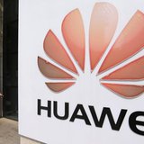A man walks past a Huawei company logo outside the entrance of a Huawei office in Wuhan, Hubei province October 9, 2012. REUTERS/Stringer A man walks past a Huawei company logo outside the entrance of a Huawei office in Wuhan, Hubei province October 9, 2012. REUTERS/Stringer