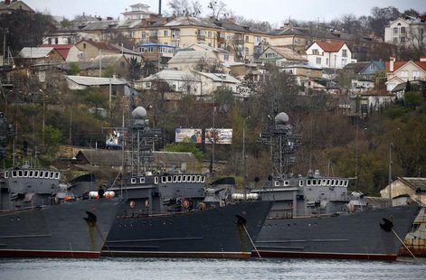 Russian Navy vessels are anchored at a navy base in the Ukrainian Black Sea port of Sevastopol in Crimea, March 28, 2014. REUTERS/Yannis Beh Russian Navy vessels are anchored at a navy base in the Ukrainian Black Sea port of Sevastopol in Crimea, March 28, 2014. REUTERS/Yannis Beh