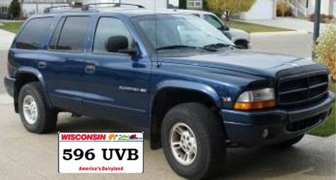 The stolen Dodge Durango looks like this similar model. Photo: Wisconsin Rapids Police Dept. The stolen Dodge Durango looks like this similar model. Photo: Wisconsin Rapids Police Dept.