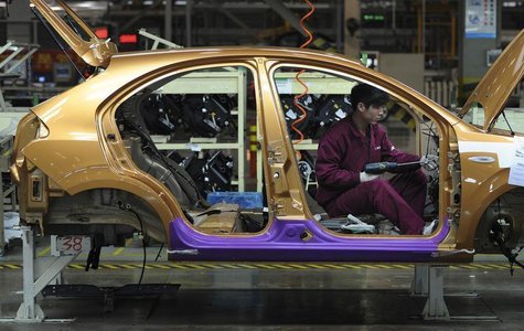 An employee works at a production line of an automobile factory in Hefei, Anhui province, January 9, 2014. REUTERS/Stringer An employee works at a production line of an automobile factory in Hefei, Anhui province, January 9, 2014. REUTERS/Stringer