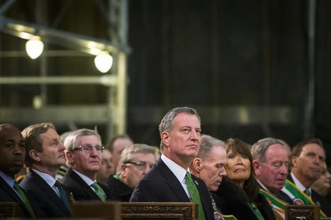 New York Mayor Bill de Blasio listens to a service at Saint Patrick's Cathedral in New York March 17, 2014. REUTERS/Lucas Jackson New York Mayor Bill de Blasio listens to a service at Saint Patrick's Cathedral in New York March 17, 2014. REUTERS/Lucas Jackson
