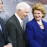 U.S. Senate Agriculture Committee Chairman Debbie Stabenow (D-MI) smiles with ranking member Senator Thad Cochrane (R-MI) (C) at a news conf U.S. Senate Agriculture Committee Chairman Debbie Stabenow (D-MI) smiles with ranking member Senator Thad Cochrane (R-MI) (C) at a news conf