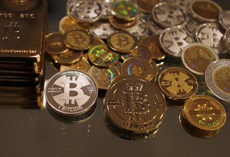 Bitcoins created by enthusiast Mike Caldwell are seen in a photo illustration at his office in Sandy, Utah, September 17, 2013. REUTERS/Jim Bitcoins created by enthusiast Mike Caldwell are seen in a photo illustration at his office in Sandy, Utah, September 17, 2013. REUTERS/Jim