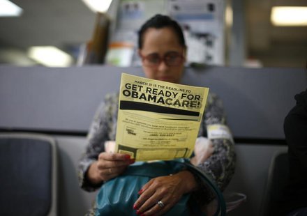 Arminda Murillo, 54, reads a leaflet at a health insurance enrollment event in Cudahy, California March 27, 2014. REUTERS/Lucy Nicholson Arminda Murillo, 54, reads a leaflet at a health insurance enrollment event in Cudahy, California March 27, 2014. REUTERS/Lucy Nicholson