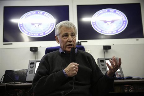 U.S. Secretary of Defense Chuck Hagel speaks to members of a travel press pool on a plane en route to Honolulu, Hawaii April 1, 2014. REUTER U.S. Secretary of Defense Chuck Hagel speaks to members of a travel press pool on a plane en route to Honolulu, Hawaii April 1, 2014. REUTER
