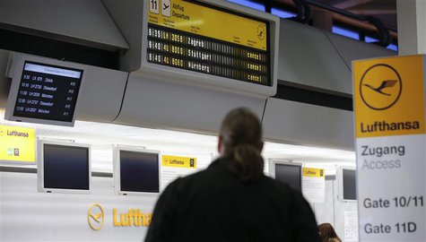 A man looks at cancelled flights by German air carrier Lufthansa on a flight schedule board at Berlin Tegel airport April 2, 2014. REUTERS/F A man looks at cancelled flights by German air carrier Lufthansa on a flight schedule board at Berlin Tegel airport April 2, 2014. REUTERS/F